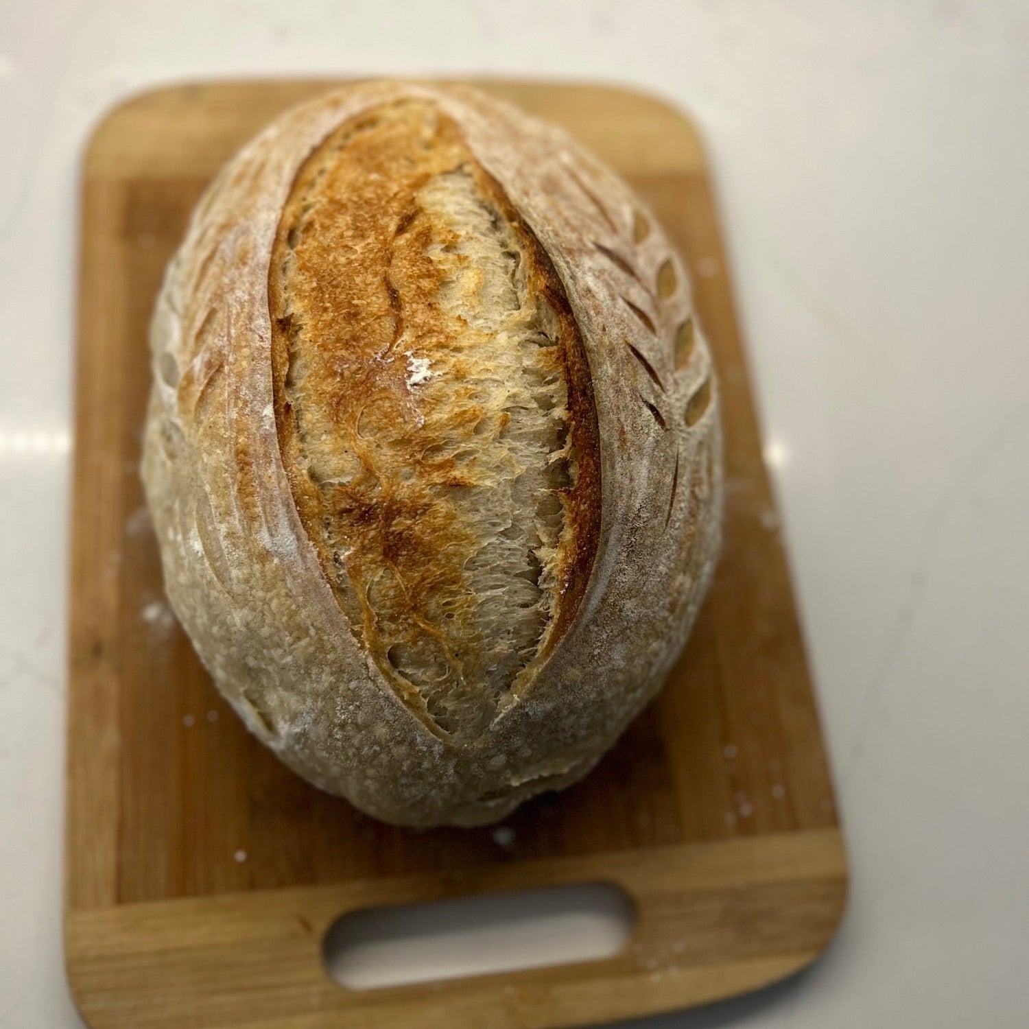 Sourdough bread on wooden cutting board