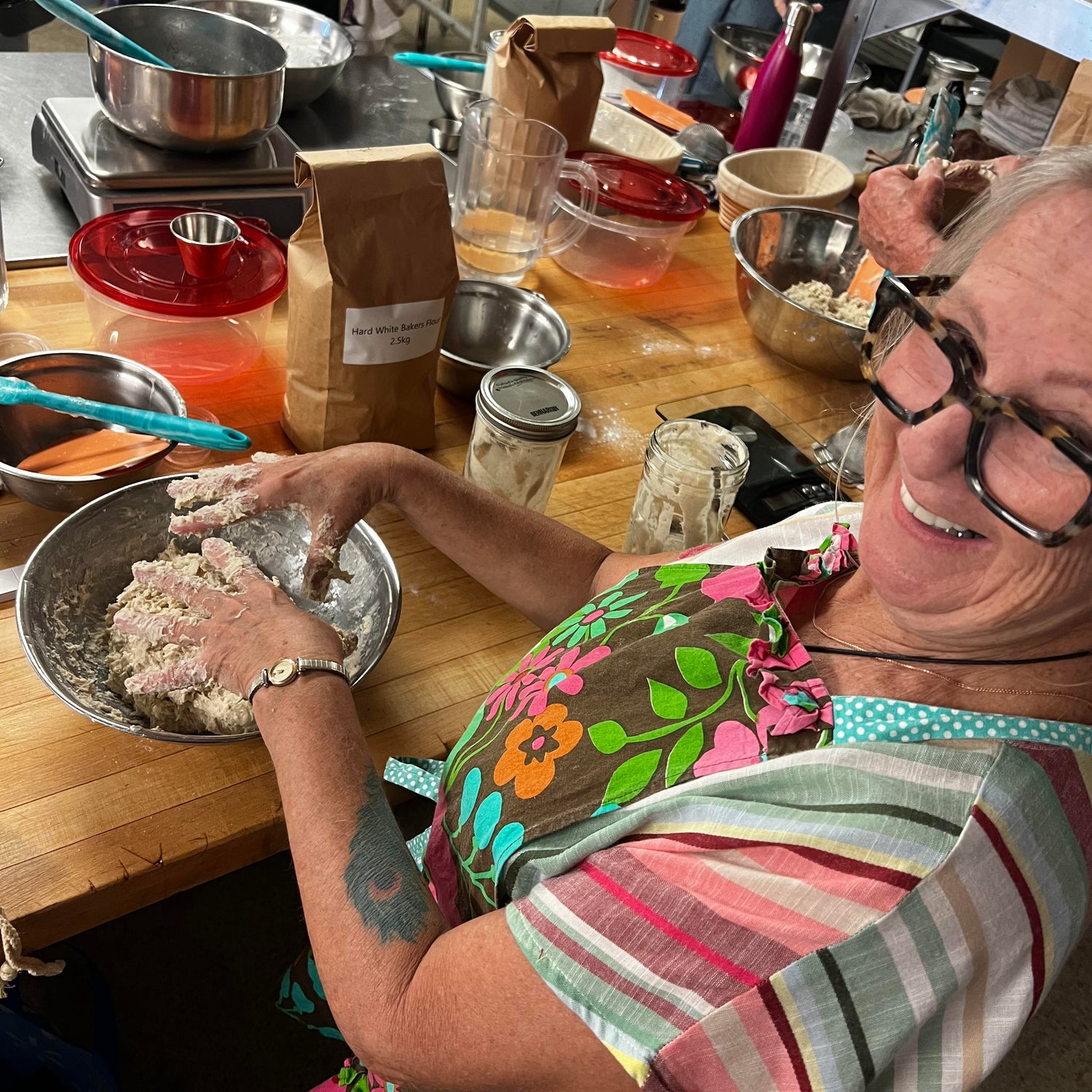 Sourdough Student with hands in dough