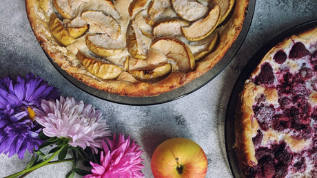 artisan pies with flowers and apple in front