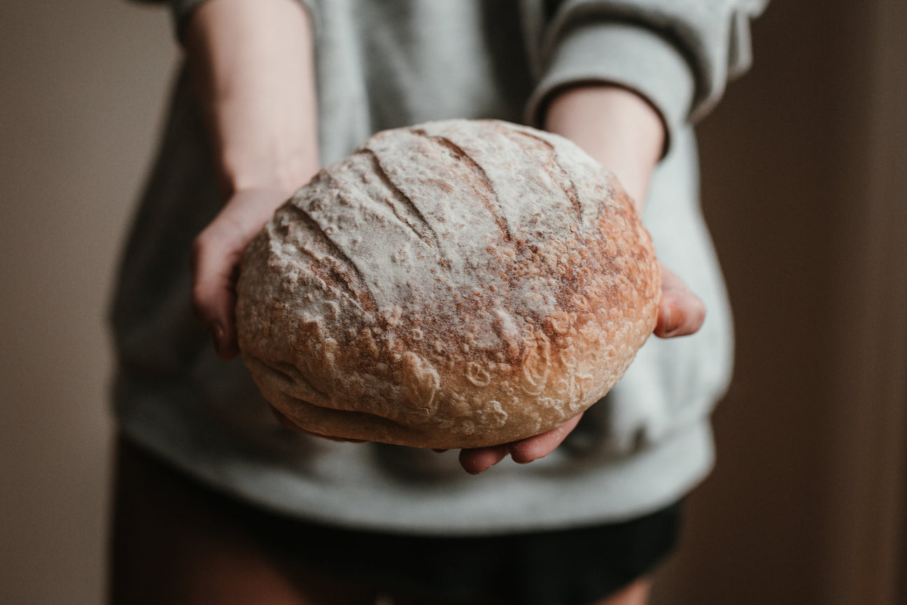 person holding sourdough