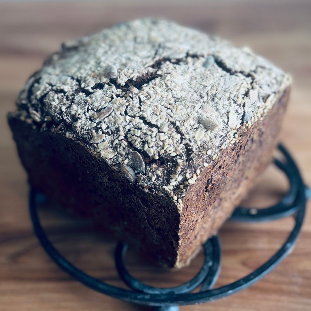 SQuare dark rye bread with seeded top